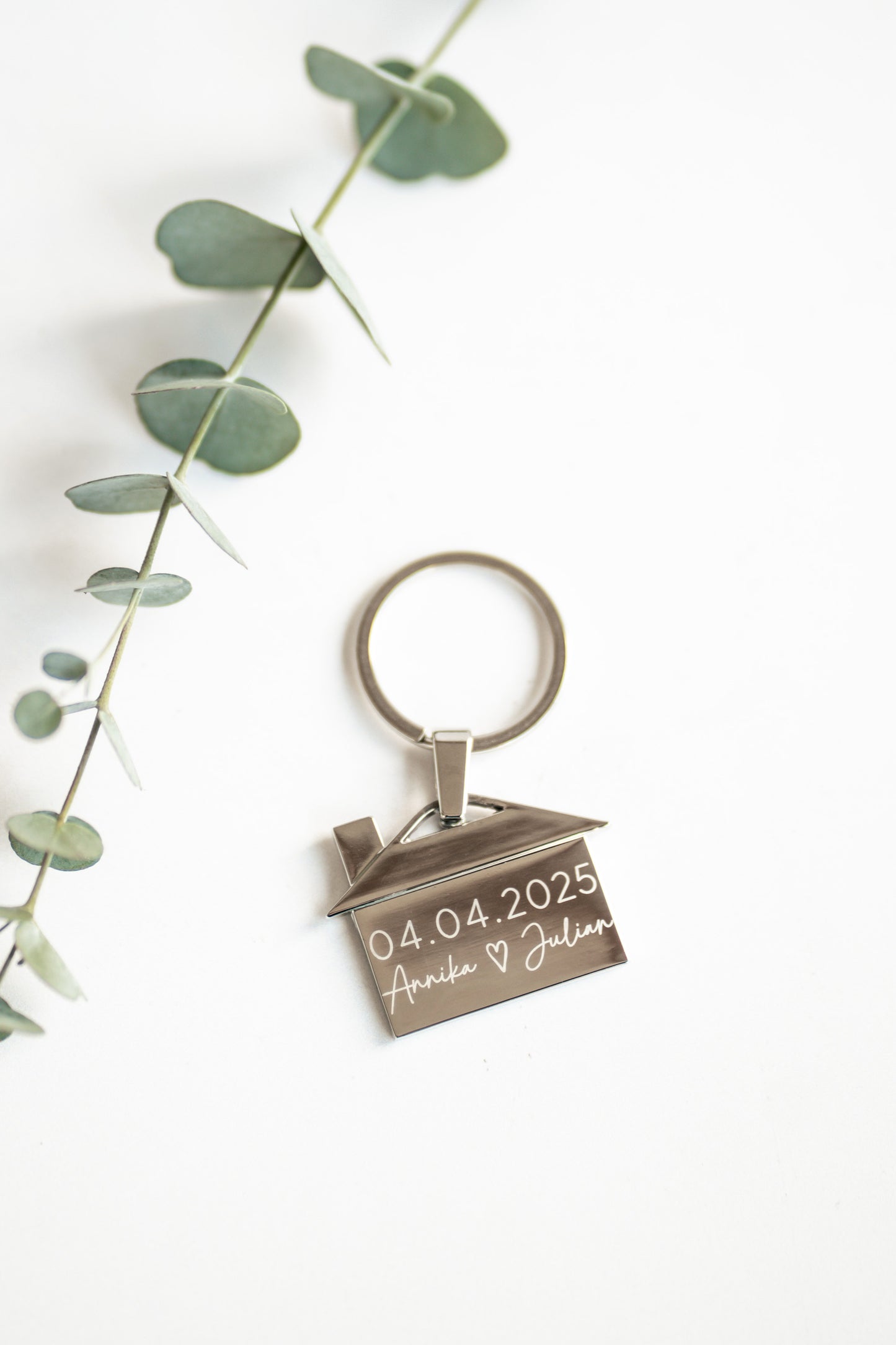 Schlüsselanhänger aus Edelstahl mit Wunschnamen und Datum