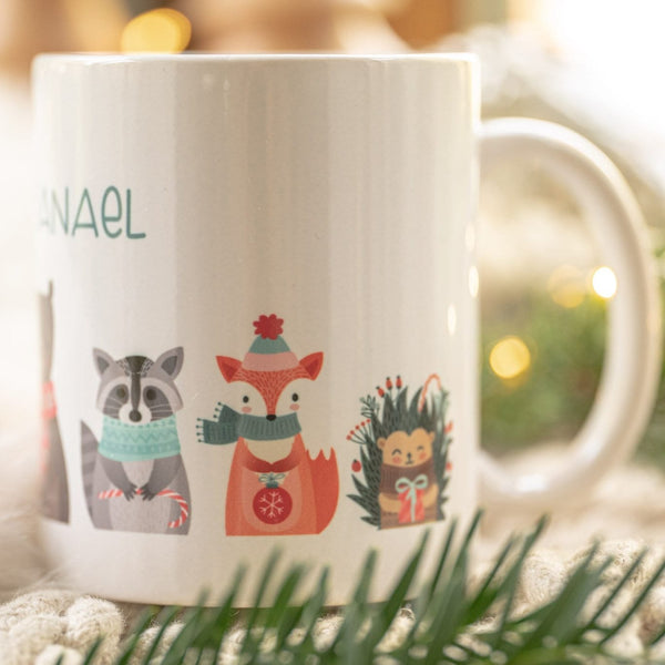 Tasse aus Keramik weiß mit Weihnachtstieren und Wunschname