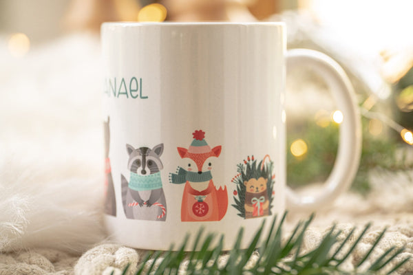 Tasse aus Keramik weiß mit Weihnachtstieren und Wunschname